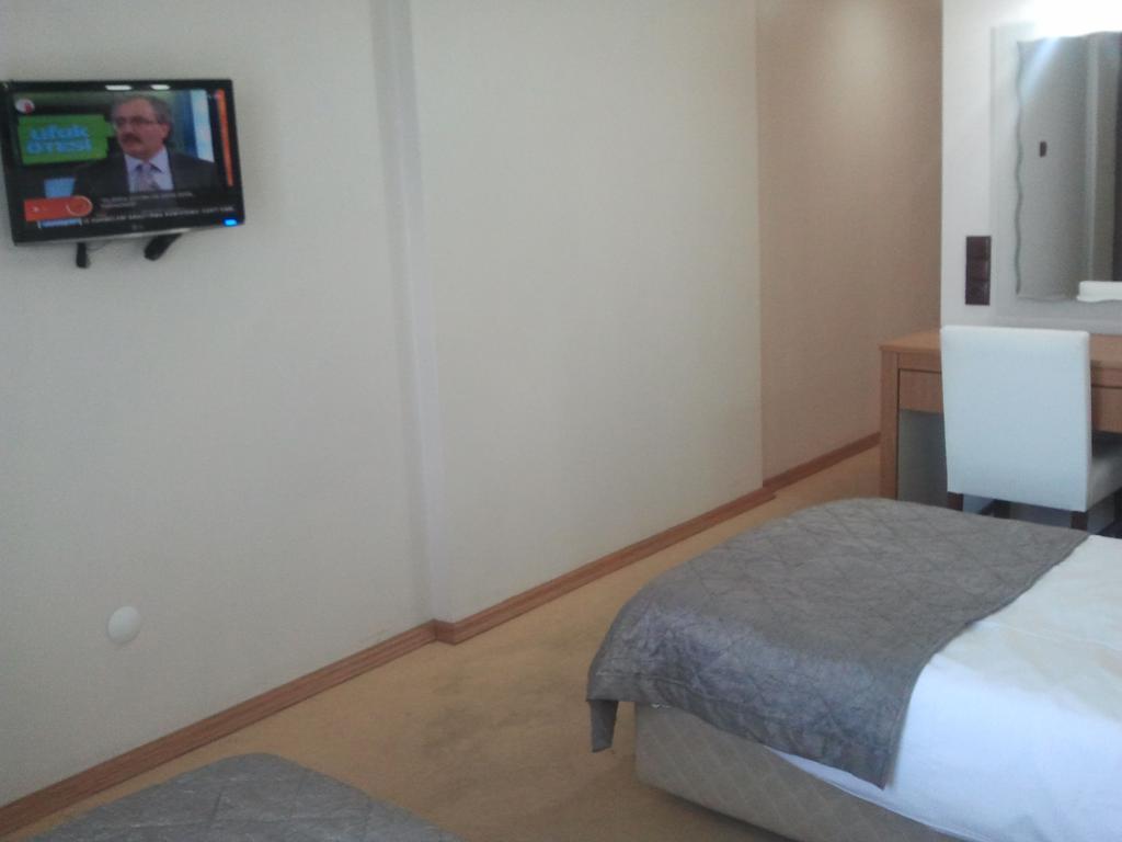 Hotel Kocaman Измир Стая снимка
